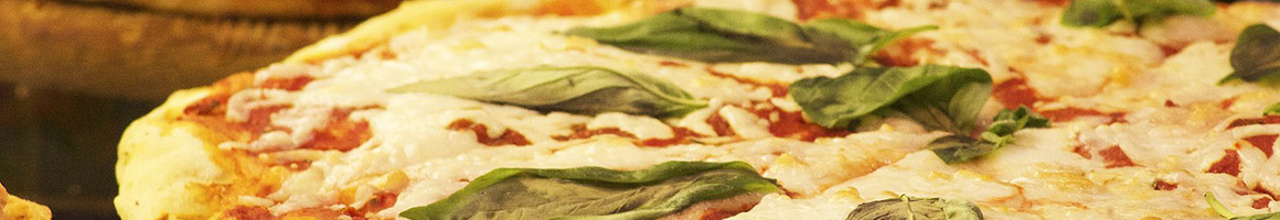 Eating Italian Pizza at FRIENDLIER 76 PIZZERIA & RISTORANTE restaurant in Woodmere, NY.